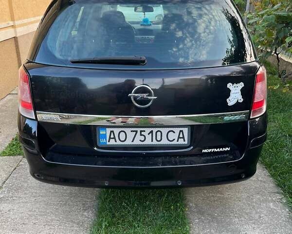 Черный Опель Астра, объемом двигателя 1.7 л и пробегом 400 тыс. км за 4500 $, фото 4 на Automoto.ua