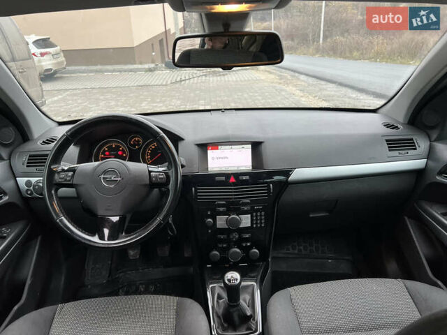 Черный Опель Астра, объемом двигателя 1.7 л и пробегом 264 тыс. км за 5799 $, фото 46 на Automoto.ua
