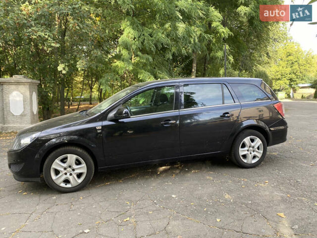 Черный Опель Астра, объемом двигателя 1.6 л и пробегом 200 тыс. км за 6400 $, фото 14 на Automoto.ua