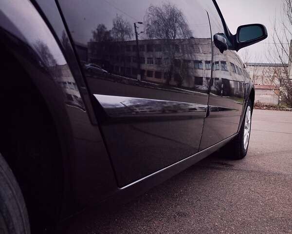 Черный Опель Астра, объемом двигателя 1.6 л и пробегом 172 тыс. км за 5350 $, фото 15 на Automoto.ua