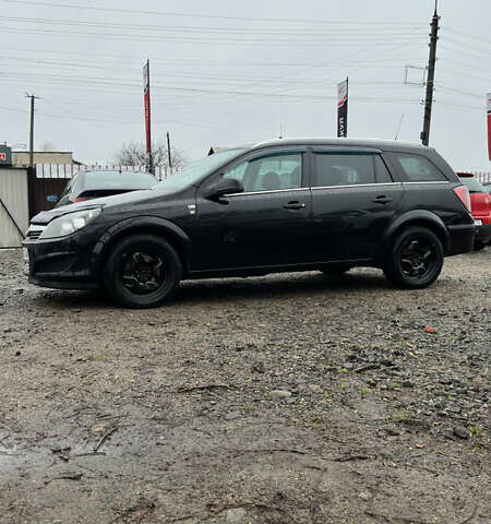 Черный Опель Астра, объемом двигателя 1.69 л и пробегом 242 тыс. км за 6200 $, фото 2 на Automoto.ua