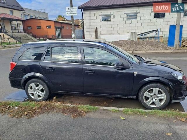 Черный Опель Астра, объемом двигателя 1.6 л и пробегом 209 тыс. км за 5100 $, фото 4 на Automoto.ua