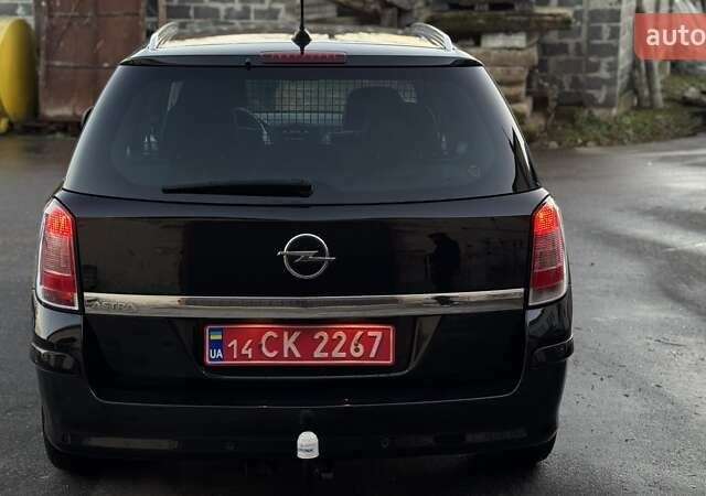 Черный Опель Астра, объемом двигателя 1.6 л и пробегом 205 тыс. км за 6150 $, фото 15 на Automoto.ua