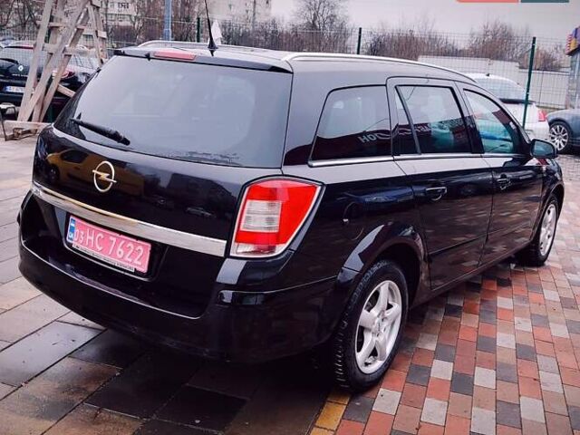 Черный Опель Астра, объемом двигателя 1.6 л и пробегом 212 тыс. км за 5750 $, фото 12 на Automoto.ua