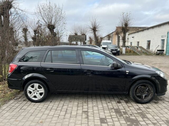 Черный Опель Астра, объемом двигателя 1.6 л и пробегом 319 тыс. км за 5200 $, фото 1 на Automoto.ua