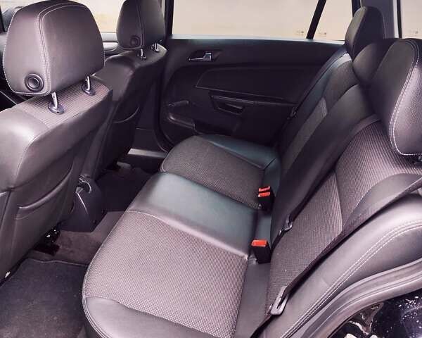 Черный Опель Астра, объемом двигателя 1.6 л и пробегом 212 тыс. км за 5750 $, фото 27 на Automoto.ua