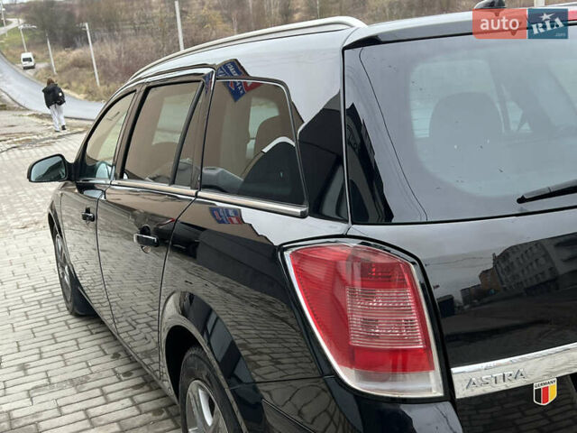 Черный Опель Астра, объемом двигателя 1.7 л и пробегом 264 тыс. км за 5799 $, фото 19 на Automoto.ua