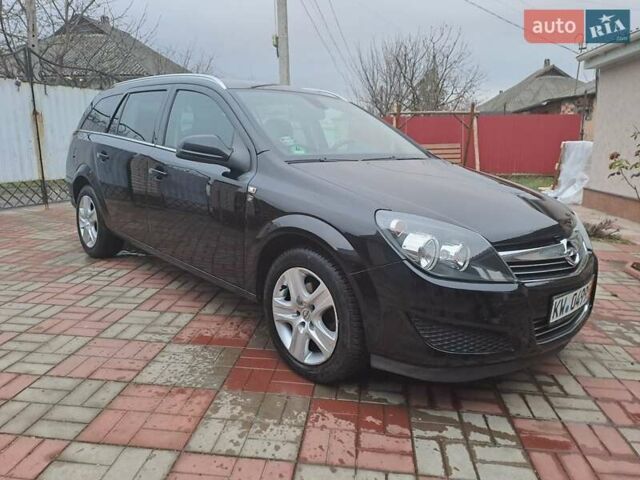 Черный Опель Астра, объемом двигателя 1.6 л и пробегом 209 тыс. км за 5800 $, фото 7 на Automoto.ua