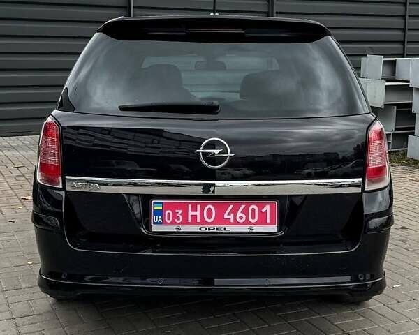 Черный Опель Астра, объемом двигателя 1.6 л и пробегом 152 тыс. км за 7200 $, фото 24 на Automoto.ua