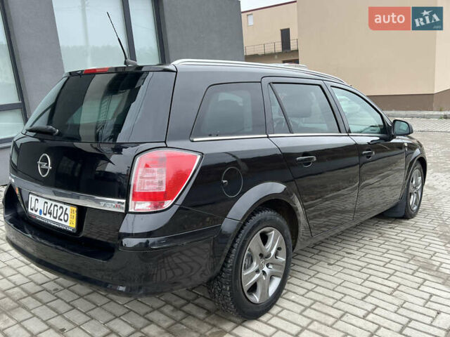 Черный Опель Астра, объемом двигателя 1.7 л и пробегом 264 тыс. км за 5799 $, фото 25 на Automoto.ua