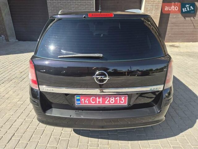 Черный Опель Астра, объемом двигателя 1.7 л и пробегом 212 тыс. км за 6400 $, фото 7 на Automoto.ua