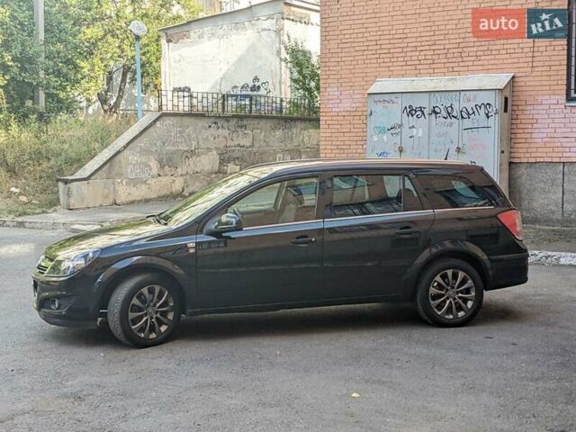 Черный Опель Астра, объемом двигателя 1.6 л и пробегом 226 тыс. км за 5600 $, фото 3 на Automoto.ua