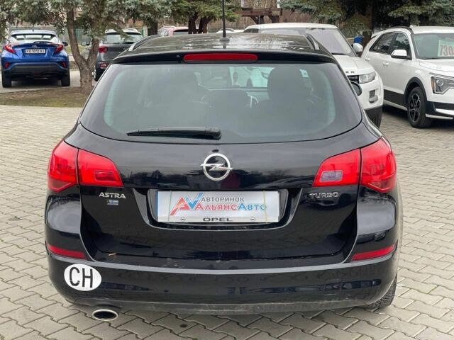 Черный Опель Астра, объемом двигателя 1.6 л и пробегом 172 тыс. км за 8600 $, фото 5 на Automoto.ua