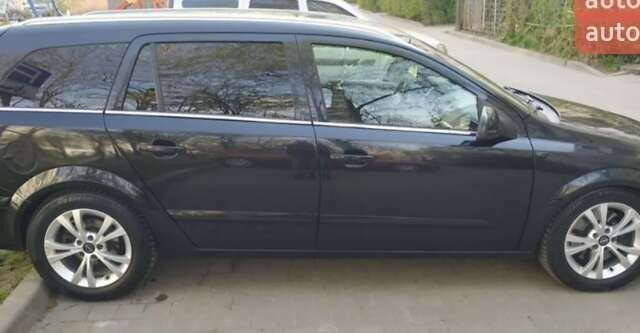 Черный Опель Астра, объемом двигателя 1.9 л и пробегом 238 тыс. км за 6300 $, фото 6 на Automoto.ua