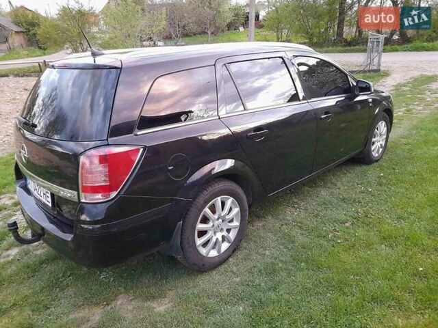 Черный Опель Астра, объемом двигателя 1.7 л и пробегом 280 тыс. км за 5800 $, фото 1 на Automoto.ua