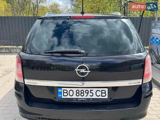 Черный Опель Астра, объемом двигателя 1.91 л и пробегом 335 тыс. км за 5600 $, фото 4 на Automoto.ua