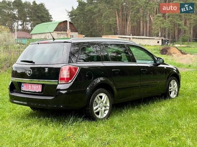 Черный Опель Астра, объемом двигателя 1.6 л и пробегом 208 тыс. км за 5950 $, фото 9 на Automoto.ua