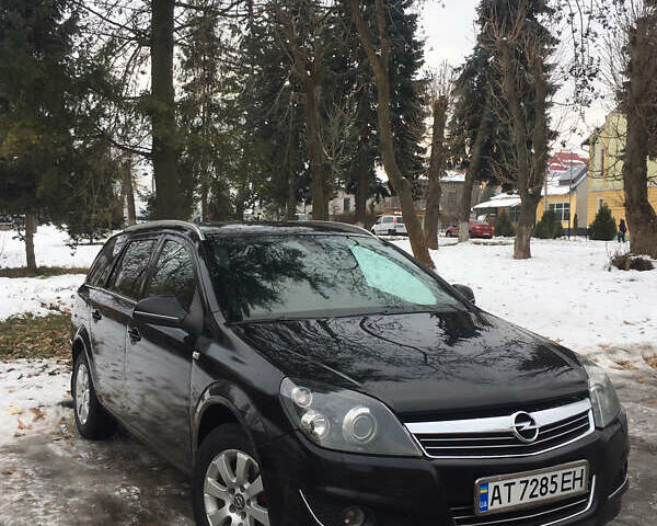 Черный Опель Астра, объемом двигателя 1.69 л и пробегом 228 тыс. км за 6500 $, фото 2 на Automoto.ua