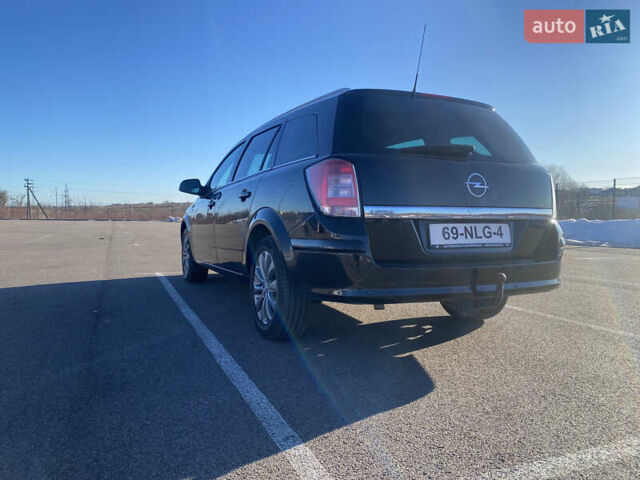 Черный Опель Астра, объемом двигателя 1.6 л и пробегом 245 тыс. км за 5900 $, фото 26 на Automoto.ua