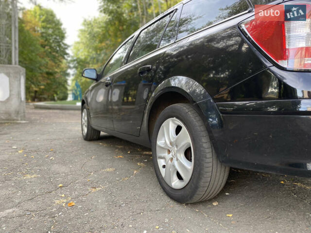 Черный Опель Астра, объемом двигателя 1.6 л и пробегом 200 тыс. км за 6400 $, фото 11 на Automoto.ua