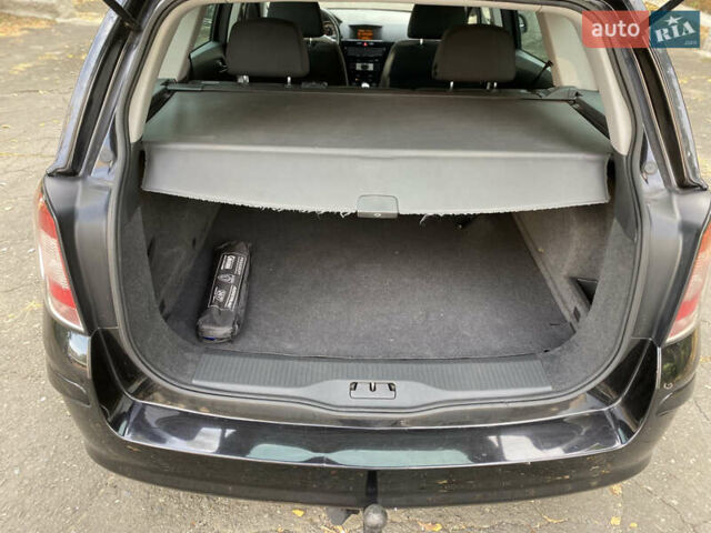 Черный Опель Астра, объемом двигателя 1.6 л и пробегом 200 тыс. км за 6400 $, фото 25 на Automoto.ua