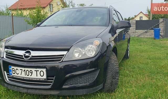 Черный Опель Астра, объемом двигателя 1.4 л и пробегом 150 тыс. км за 6100 $, фото 8 на Automoto.ua