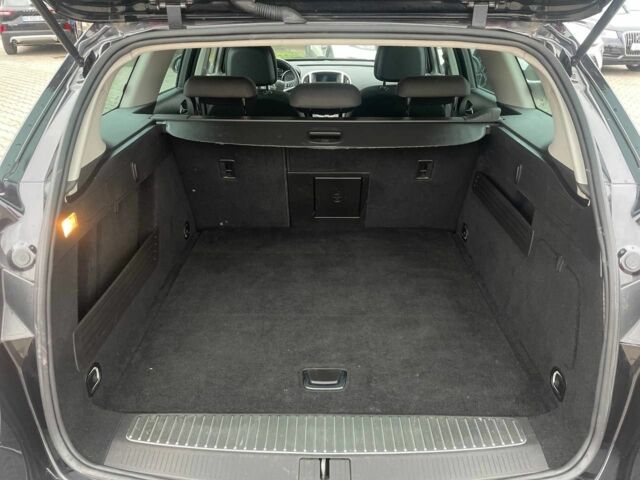 Черный Опель Астра, объемом двигателя 1.6 л и пробегом 172 тыс. км за 8600 $, фото 22 на Automoto.ua