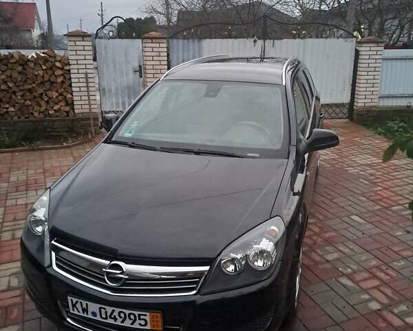 Черный Опель Астра, объемом двигателя 1.6 л и пробегом 209 тыс. км за 5800 $, фото 1 на Automoto.ua