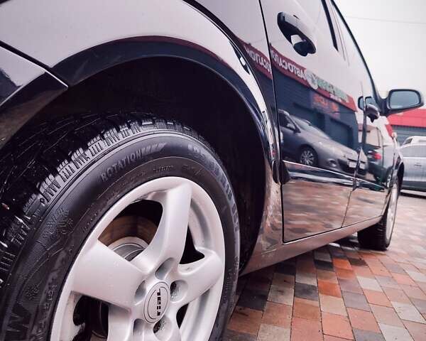 Черный Опель Астра, объемом двигателя 1.6 л и пробегом 212 тыс. км за 5750 $, фото 13 на Automoto.ua