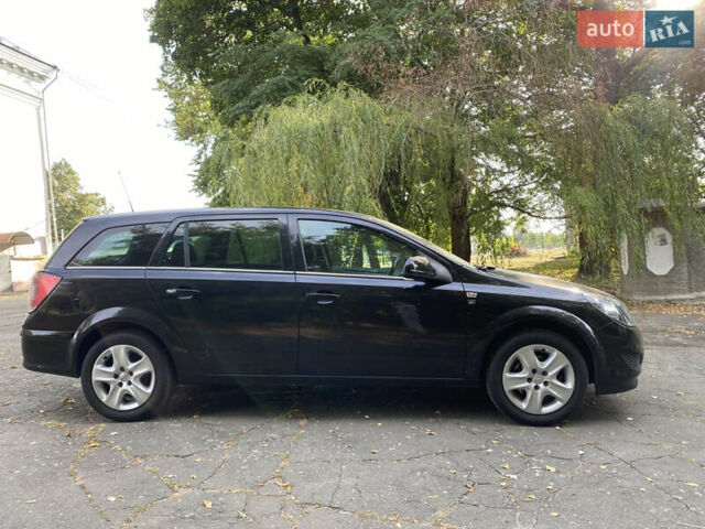 Черный Опель Астра, объемом двигателя 1.6 л и пробегом 200 тыс. км за 6400 $, фото 2 на Automoto.ua