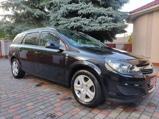 Черный Опель Астра, объемом двигателя 1.4 л и пробегом 215 тыс. км за 5900 $, фото 1 на Automoto.ua