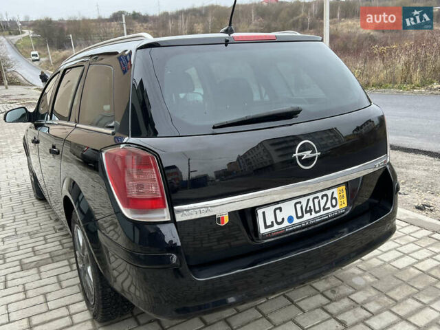 Черный Опель Астра, объемом двигателя 1.7 л и пробегом 264 тыс. км за 5799 $, фото 20 на Automoto.ua