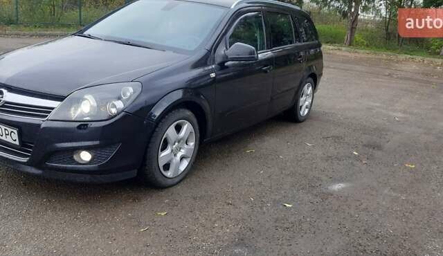 Черный Опель Астра, объемом двигателя 1.69 л и пробегом 252 тыс. км за 5600 $, фото 12 на Automoto.ua