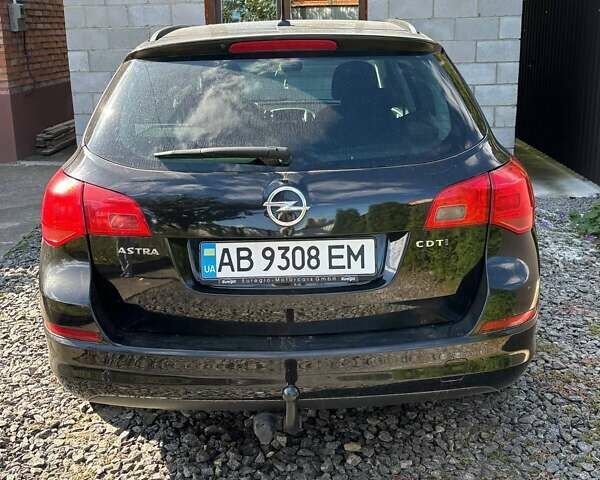 Черный Опель Астра, объемом двигателя 1.69 л и пробегом 249 тыс. км за 6500 $, фото 2 на Automoto.ua