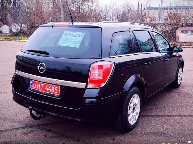 Черный Опель Астра, объемом двигателя 1.6 л и пробегом 172 тыс. км за 5350 $, фото 5 на Automoto.ua