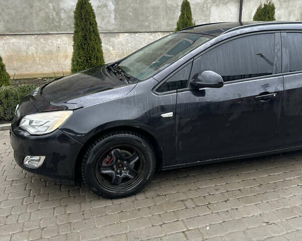 Черный Опель Астра, объемом двигателя 1.3 л и пробегом 264 тыс. км за 6500 $, фото 3 на Automoto.ua