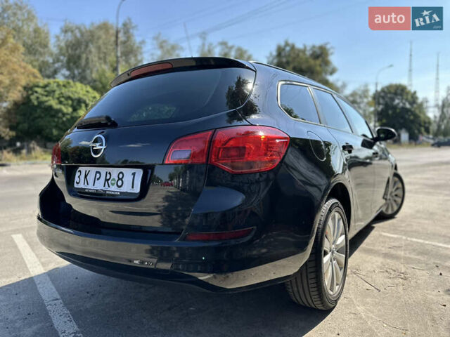 Черный Опель Астра, объемом двигателя 1.6 л и пробегом 238 тыс. км за 6500 $, фото 3 на Automoto.ua