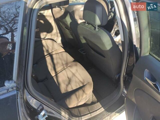 Черный Опель Астра, объемом двигателя 1.4 л и пробегом 229 тыс. км за 8760 $, фото 3 на Automoto.ua