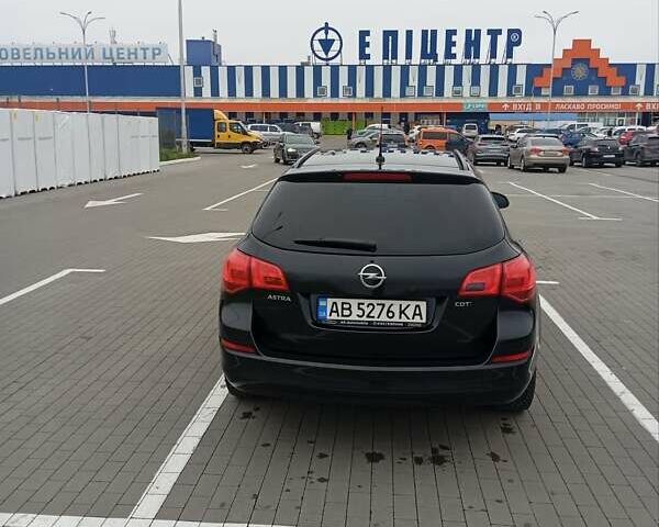Чорний Опель Астра, об'ємом двигуна 1.69 л та пробігом 320 тис. км за 6900 $, фото 1 на Automoto.ua