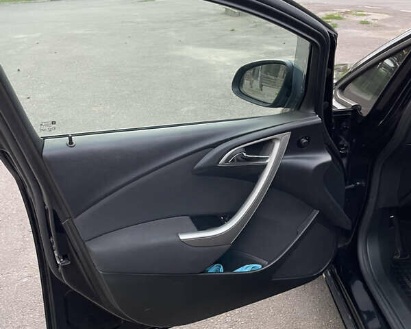 Черный Опель Астра, объемом двигателя 1.6 л и пробегом 182 тыс. км за 8100 $, фото 24 на Automoto.ua