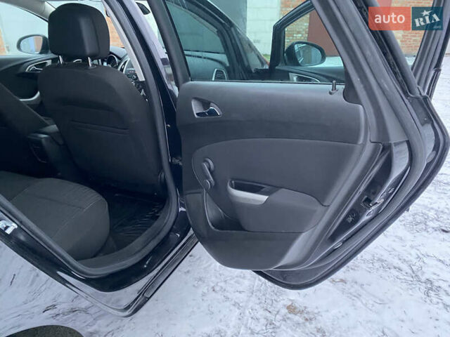 Черный Опель Астра, объемом двигателя 1.6 л и пробегом 230 тыс. км за 7300 $, фото 26 на Automoto.ua