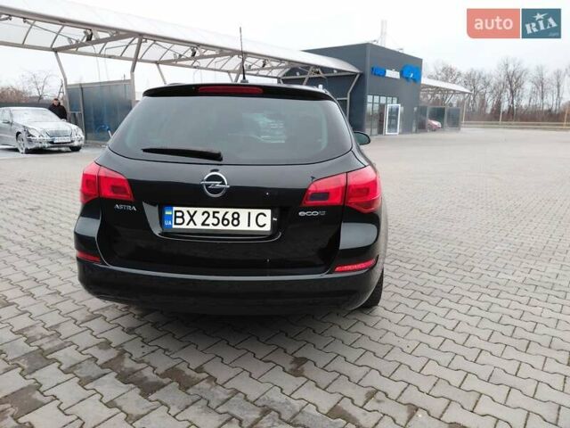 Черный Опель Астра, объемом двигателя 1.25 л и пробегом 1 тыс. км за 6200 $, фото 27 на Automoto.ua