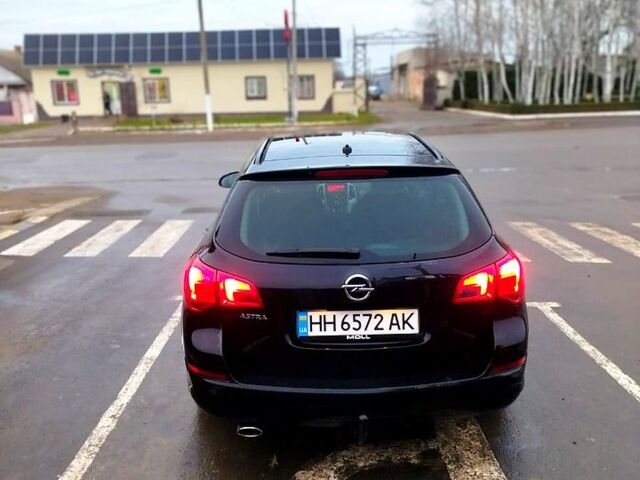 Черный Опель Астра, объемом двигателя 1.4 л и пробегом 307 тыс. км за 6500 $, фото 2 на Automoto.ua