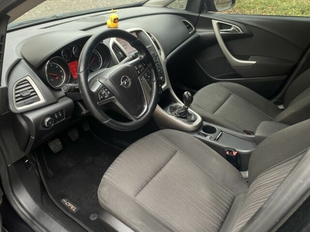 Черный Опель Астра, объемом двигателя 1.2 л и пробегом 310 тыс. км за 6800 $, фото 6 на Automoto.ua