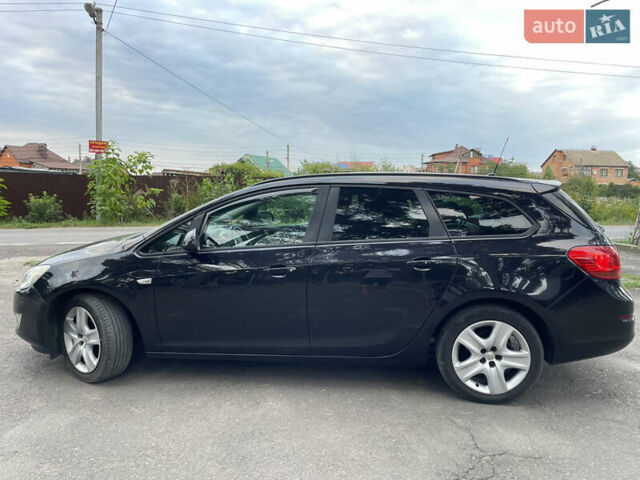 Черный Опель Астра, объемом двигателя 1.6 л и пробегом 182 тыс. км за 8100 $, фото 8 на Automoto.ua