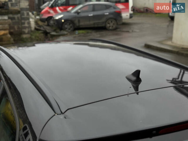 Черный Опель Астра, объемом двигателя 1.4 л и пробегом 225 тыс. км за 6350 $, фото 11 на Automoto.ua