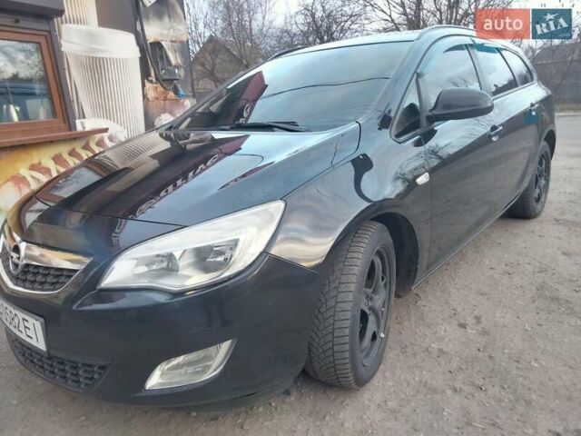 Черный Опель Астра, объемом двигателя 1.7 л и пробегом 270 тыс. км за 7000 $, фото 1 на Automoto.ua