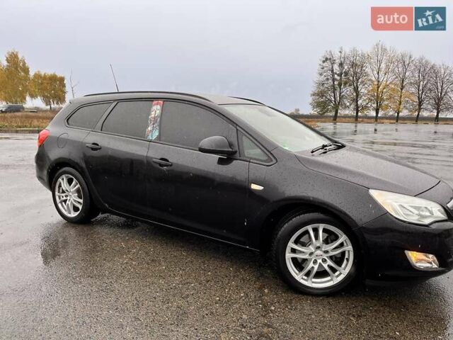 Черный Опель Астра, объемом двигателя 1.7 л и пробегом 252 тыс. км за 6850 $, фото 4 на Automoto.ua