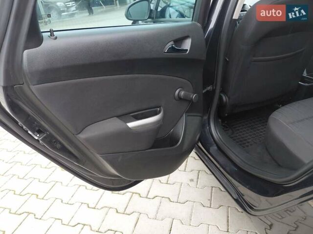 Черный Опель Астра, объемом двигателя 1.25 л и пробегом 1 тыс. км за 6200 $, фото 22 на Automoto.ua