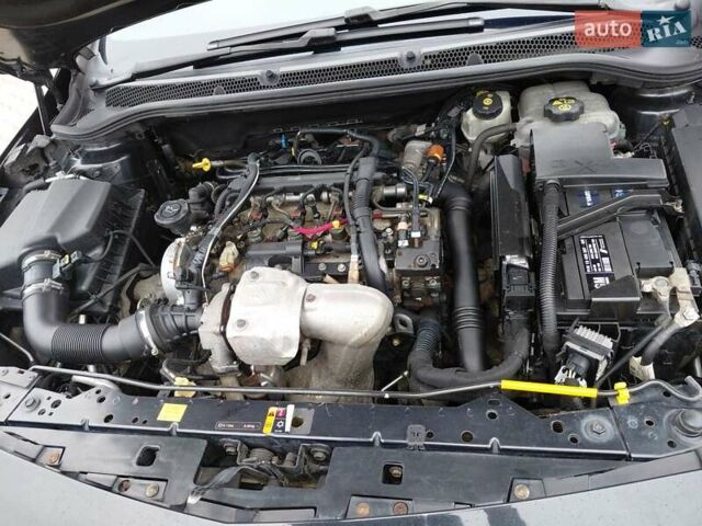 Черный Опель Астра, объемом двигателя 1.25 л и пробегом 1 тыс. км за 6200 $, фото 2 на Automoto.ua